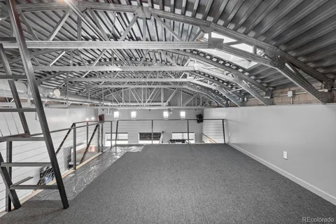 a view of swimming pool and outdoor seating