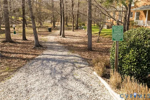 an aerial view of a houses with ocean view
