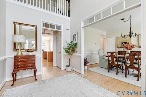 a view of a livingroom with furniture and a potted plant