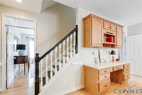 a bathroom with a sink vanity and a mirror