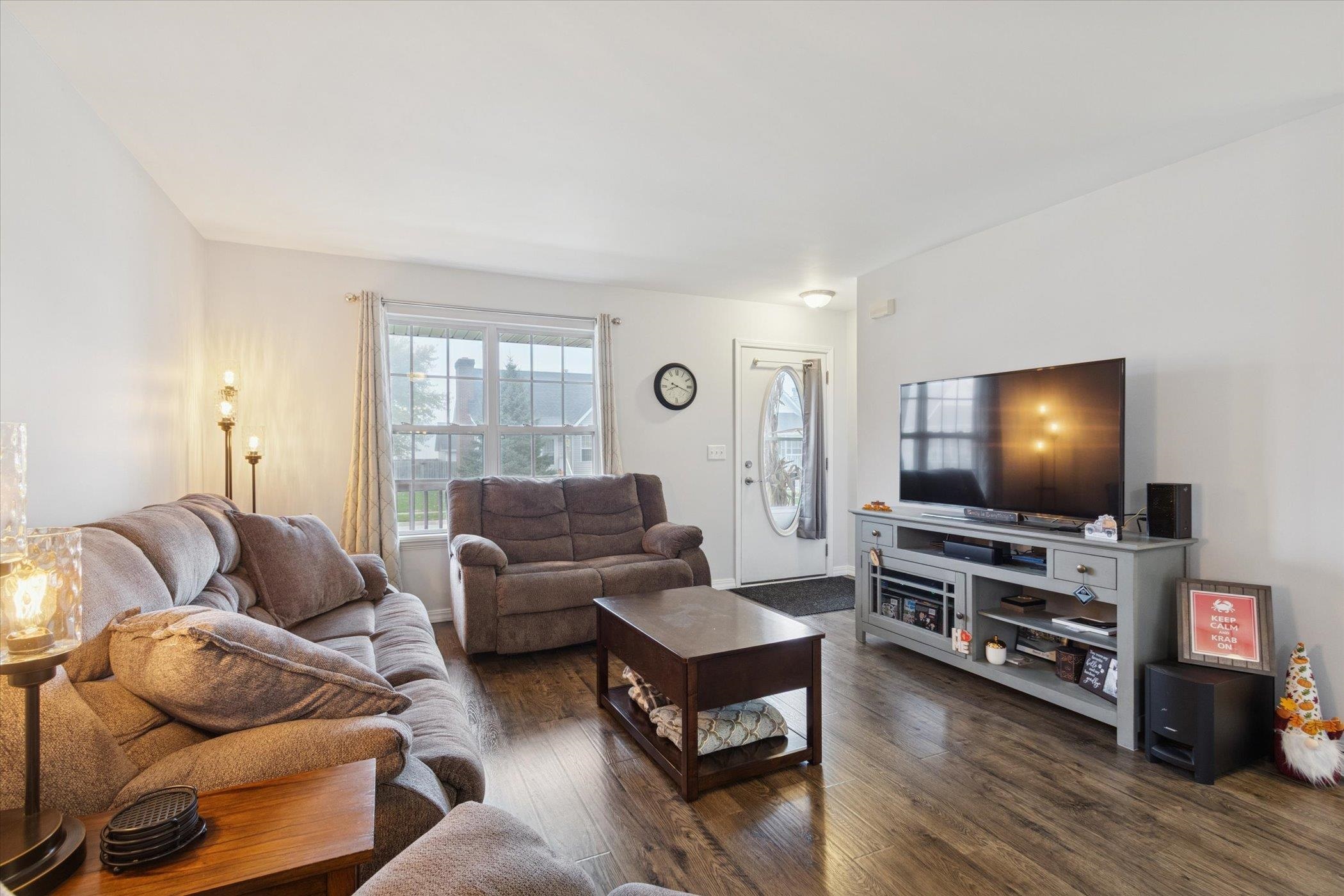 718 West Prospect Street Kirkland, IL 60146 - Photo 13 of 41 a living room with furniture and a flat screen tv