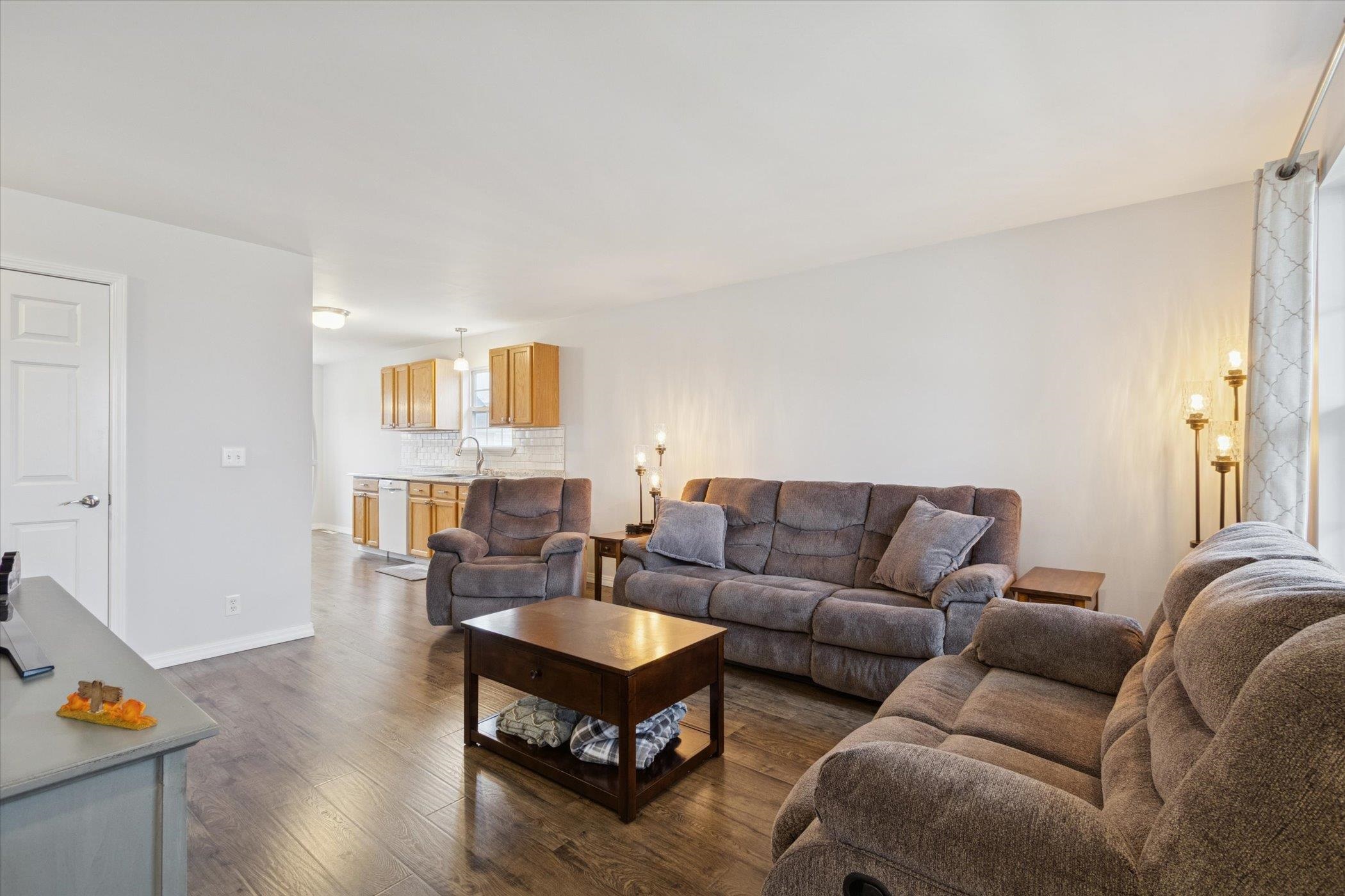 718 West Prospect Street Kirkland, IL 60146 - Photo 14 of 41 a living room with furniture wooden floor and a window