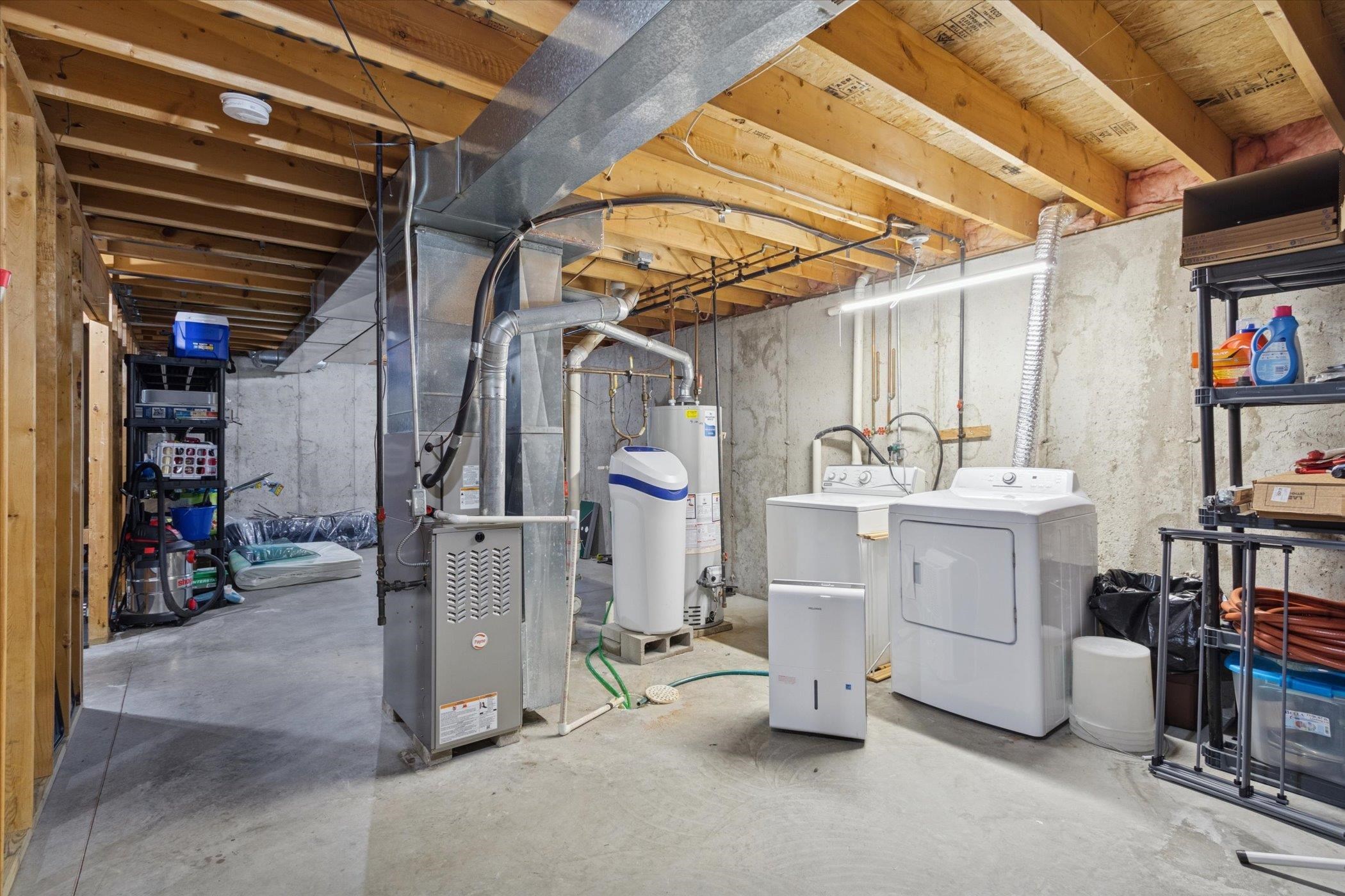 718 West Prospect Street Kirkland, IL 60146 - Photo 30 of 41 a utility room with cabinets