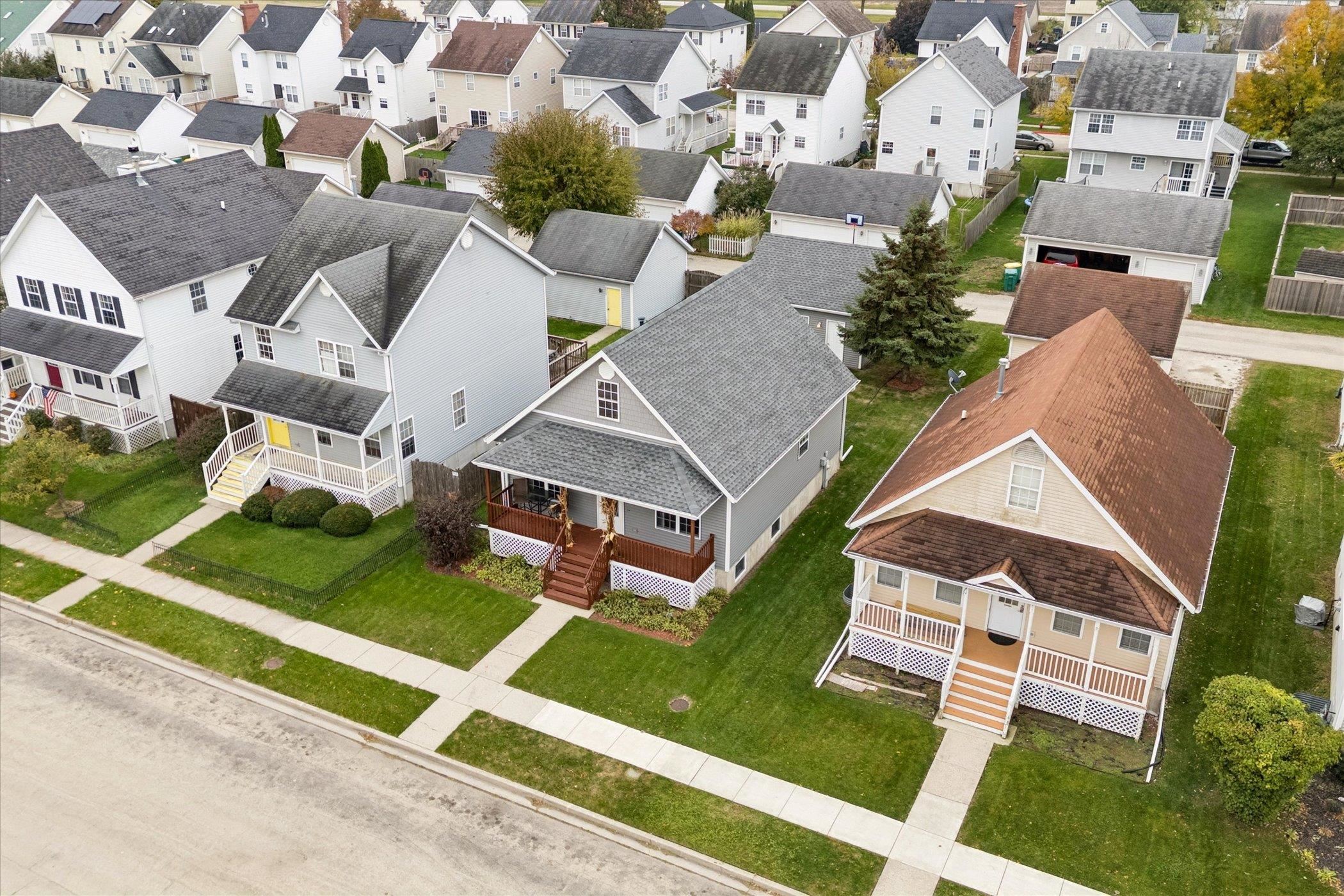 718 West Prospect Street Kirkland, IL 60146 - Photo 36 of 41 an aerial view of residential houses with yard