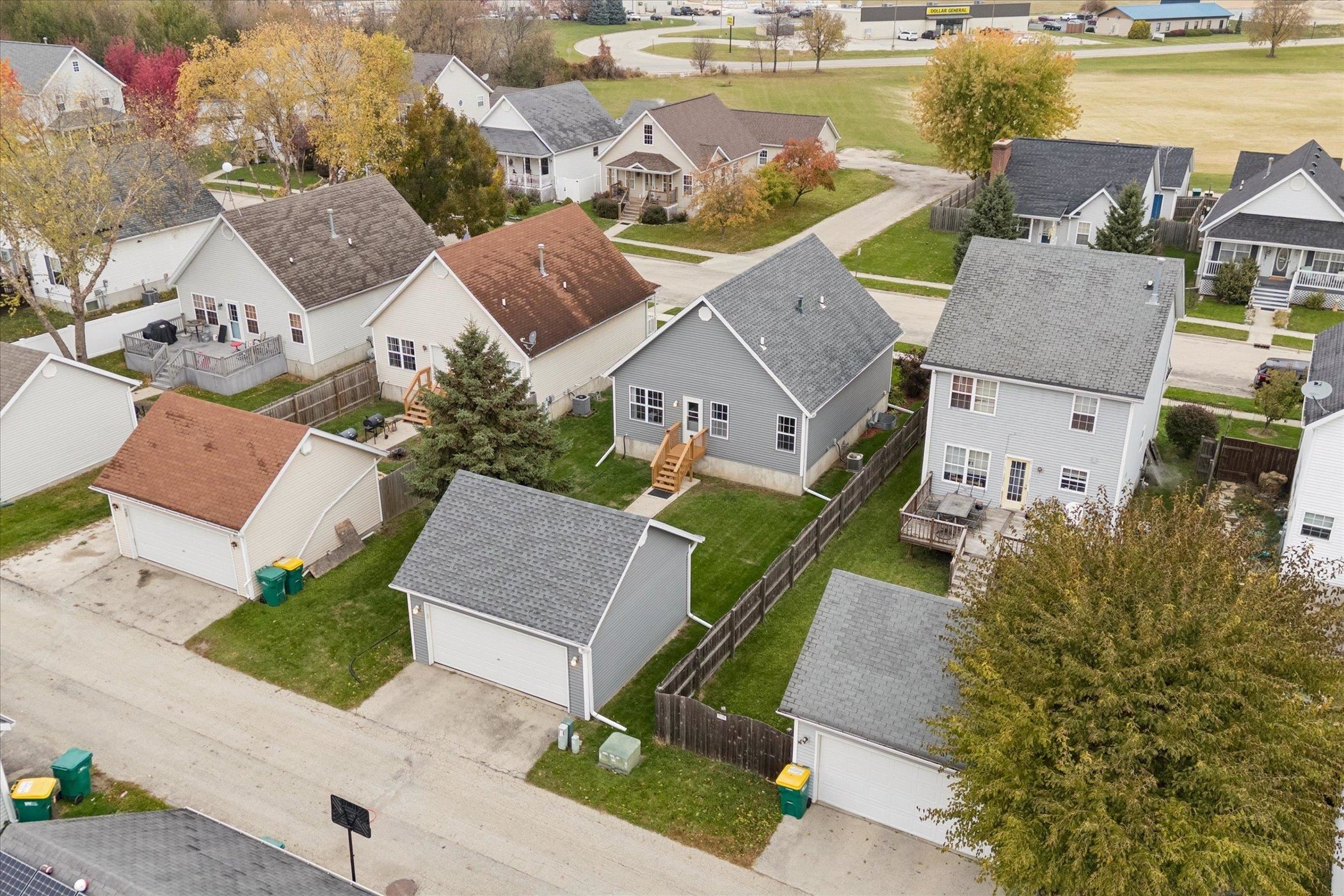 718 West Prospect Street Kirkland, IL 60146 - Photo 37 of 41 an aerial view of a house with outdoor space and ocean view