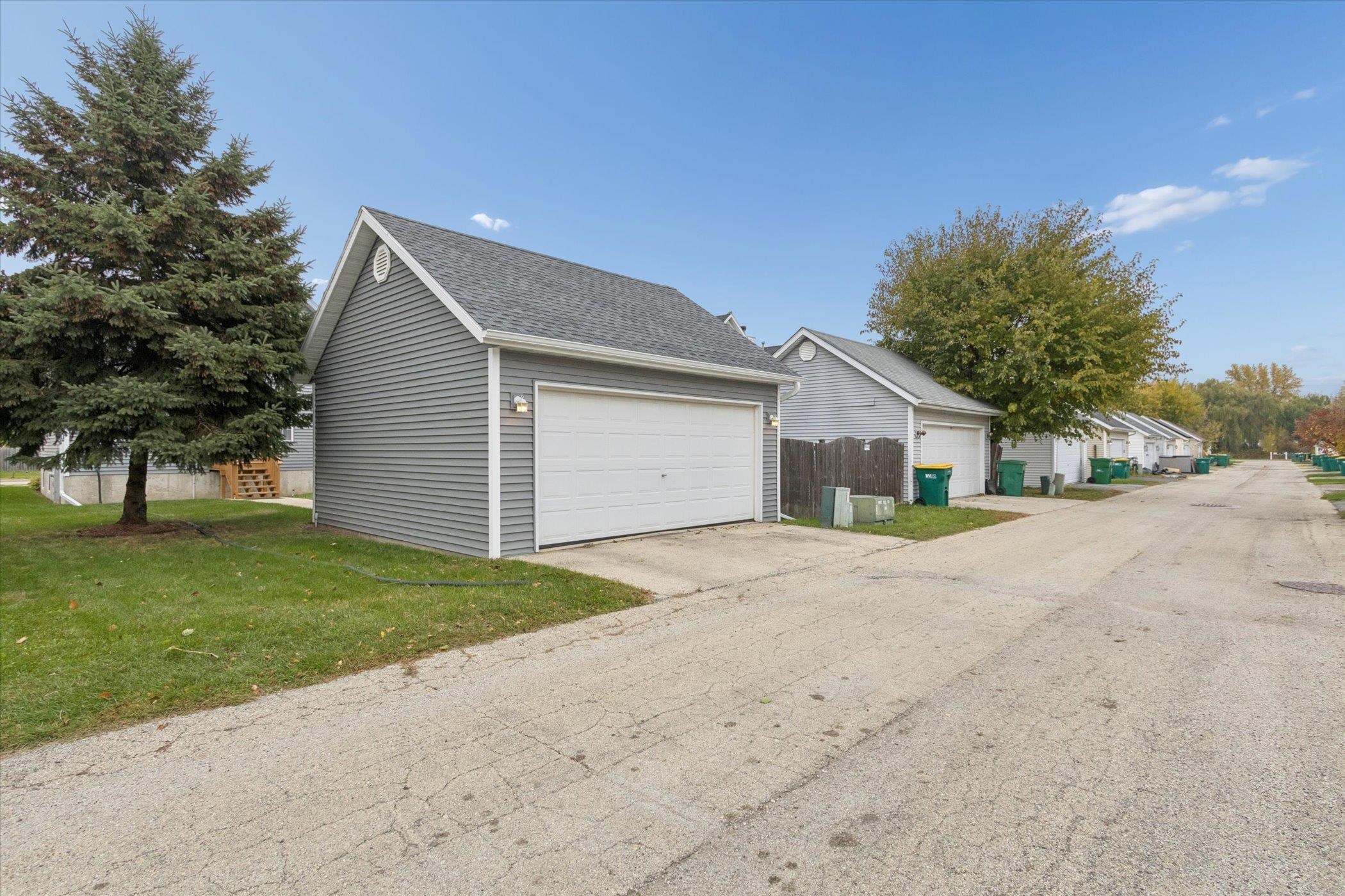 718 West Prospect Street Kirkland, IL 60146 - Photo 8 of 41 a front view of house with yard and trees