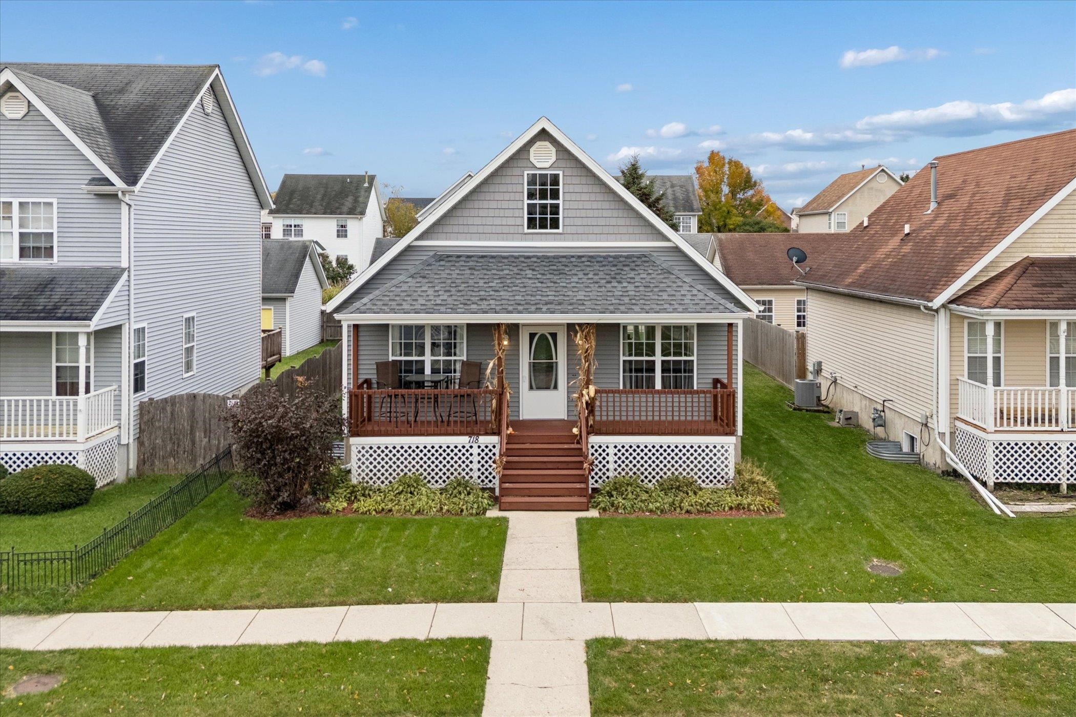 718 West Prospect Street Kirkland, IL 60146 - Photo 10 of 41 a front view of a house with a yard