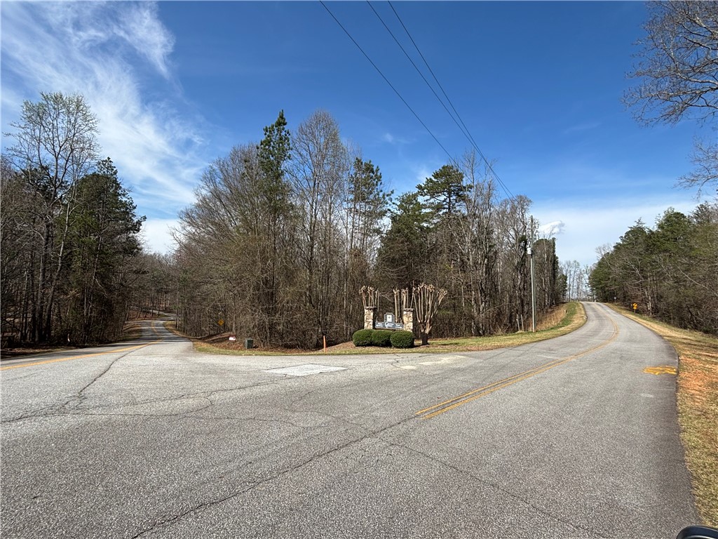 3.53 Coneross Point Drive Seneca, SC 29678 - Photo 13 of 13 This scenic rural road entrance provides direct access to a tranquil wooded setting.