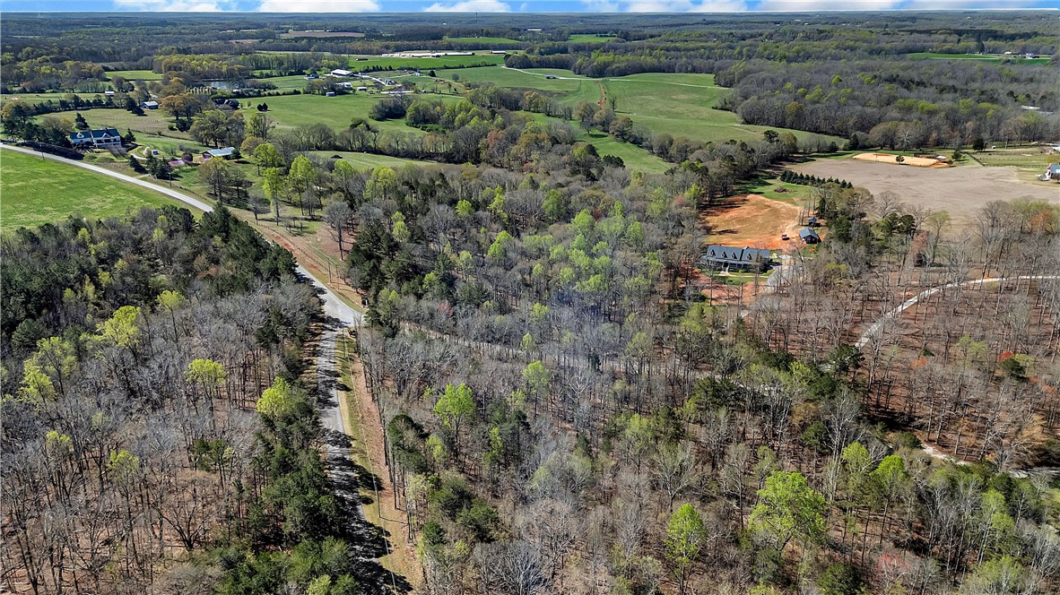 3.53 Coneross Point Drive Seneca, SC 29678 - Photo 8 of 13 Expansive acreage provides a verdant backdrop for serene living, complete with private residences and winding roads.