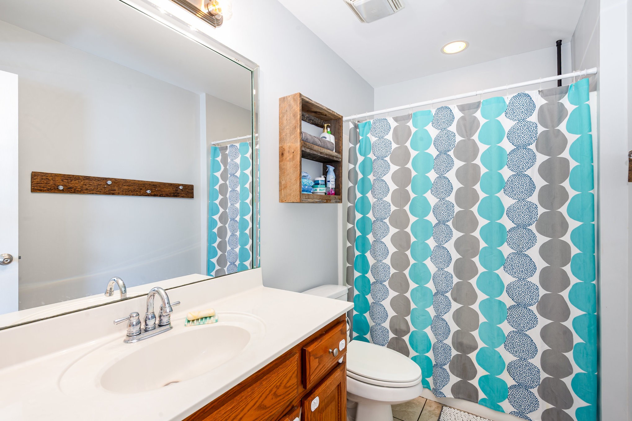 879 Rock Bridge Road Bethpage, TN 37022 - Photo 22 of 39 a bathroom with a sink and a mirror