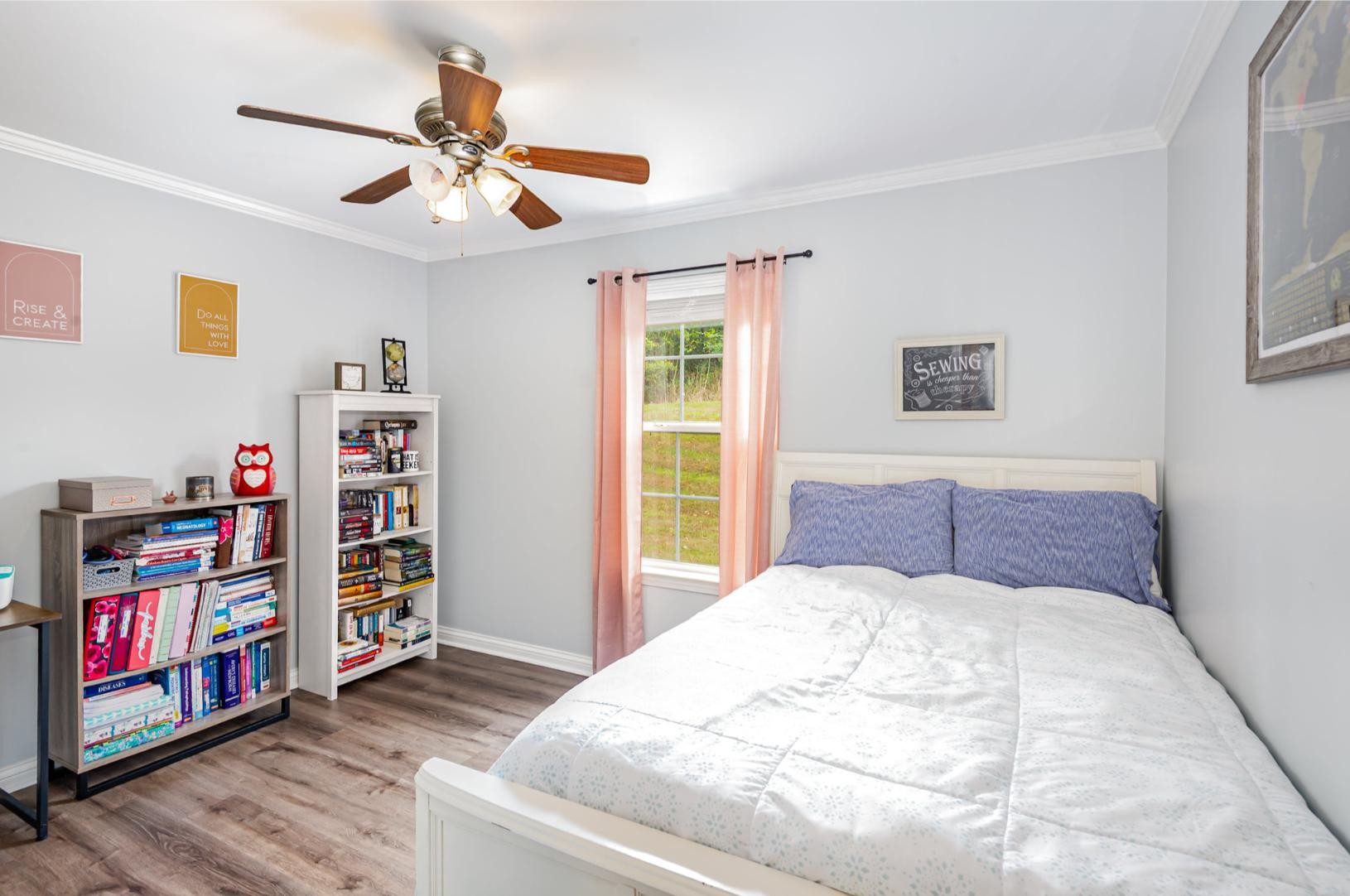 879 Rock Bridge Road Bethpage, TN 37022 - Photo 23 of 39 a bedroom with a bed and a large window