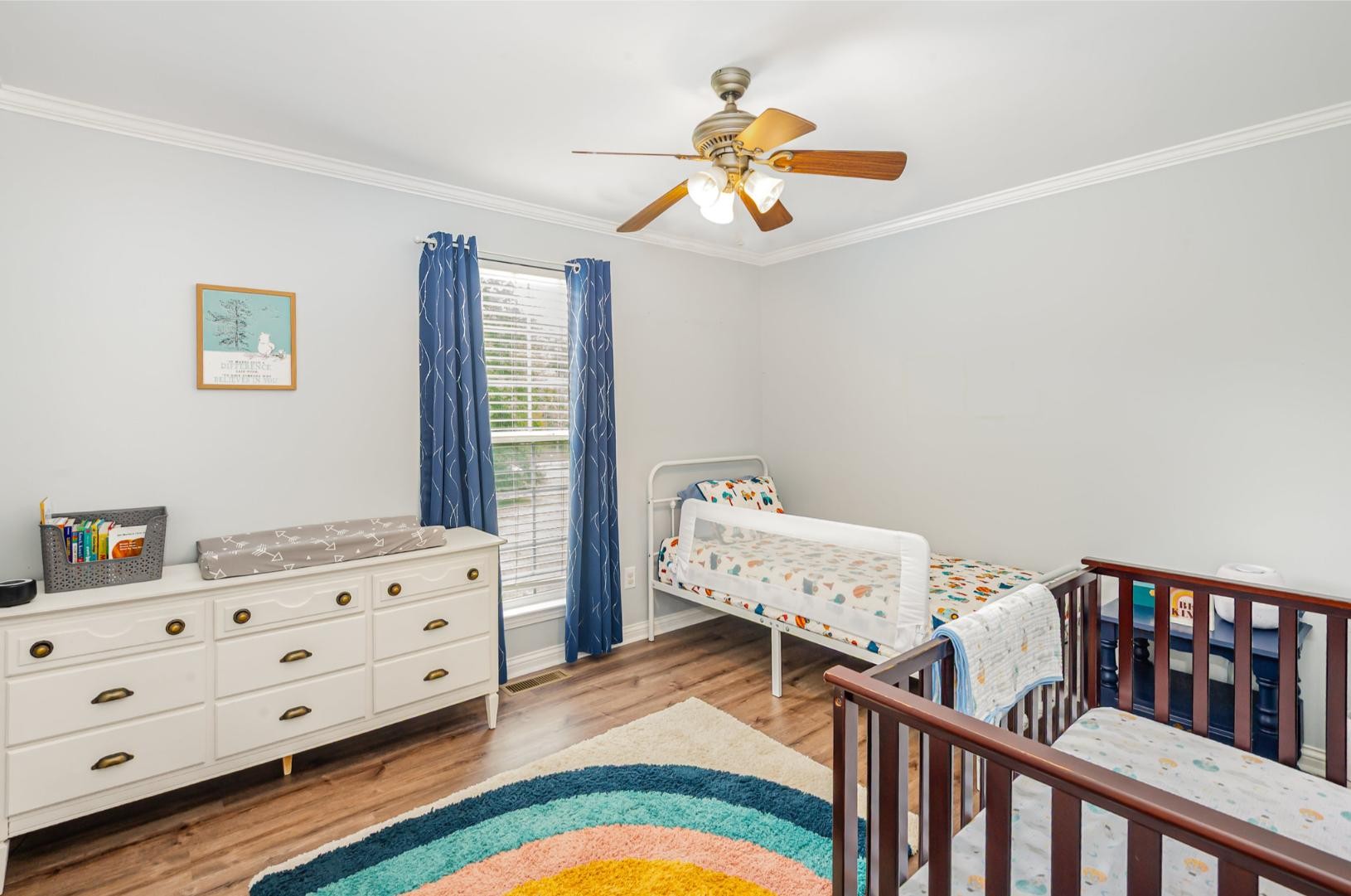 879 Rock Bridge Road Bethpage, TN 37022 - Photo 26 of 39 a bedroom with furniture and wooden floor