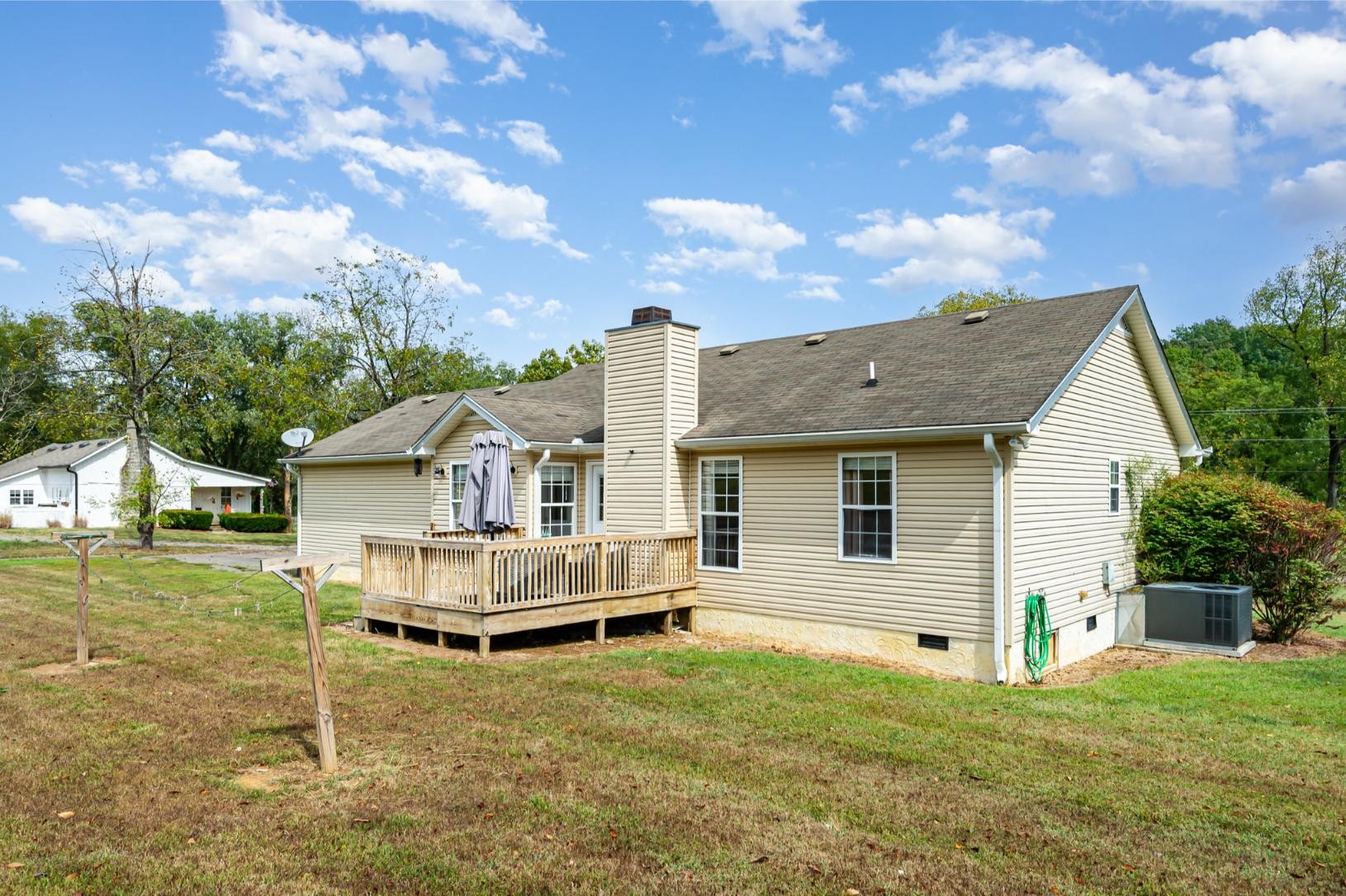 879 Rock Bridge Road Bethpage, TN 37022 - Photo 33 of 39 a view of a house with a yard