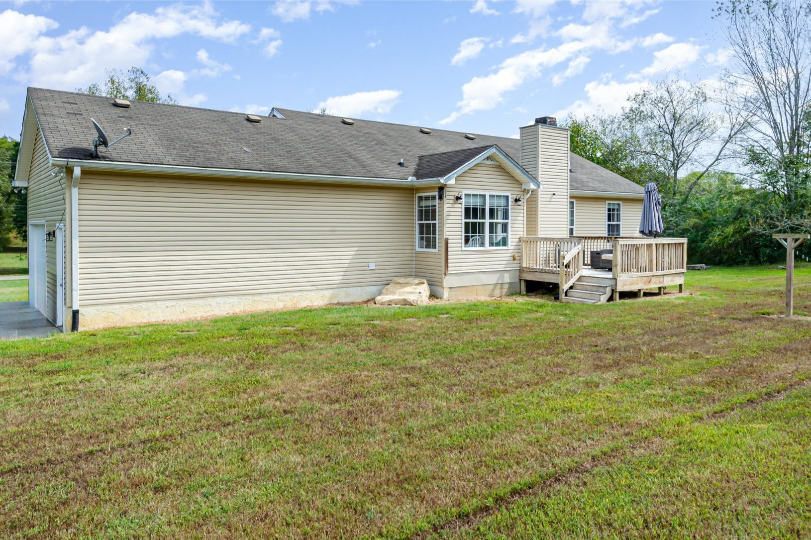 879 Rock Bridge Road Bethpage, TN 37022 - Photo 34 of 39 a front view of a house with garden