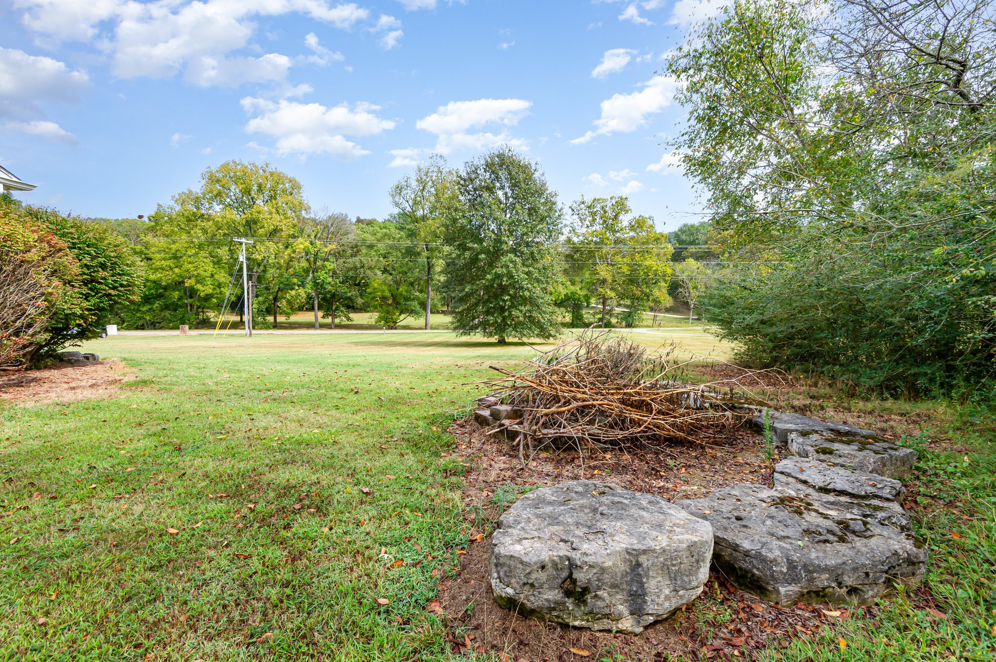 879 Rock Bridge Road Bethpage, TN 37022 - Photo 37 of 39 a view of a large yard with lots of green space