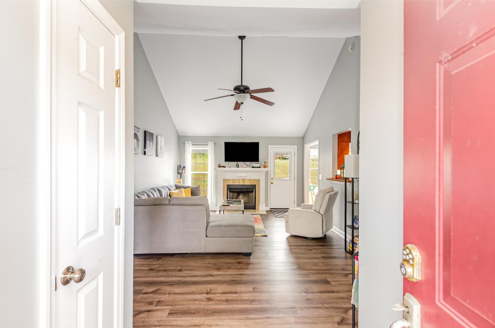 879 Rock Bridge Road Bethpage, TN 37022 - Photo 6 of 39 a living room with furniture and a fireplace
