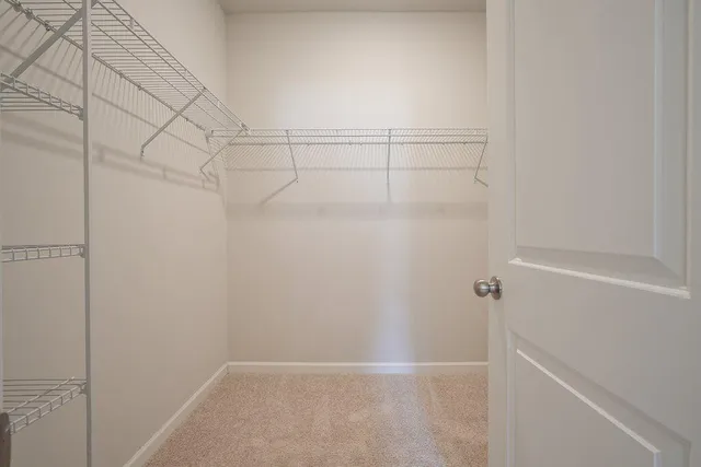 a city view with tall buildings and a yard