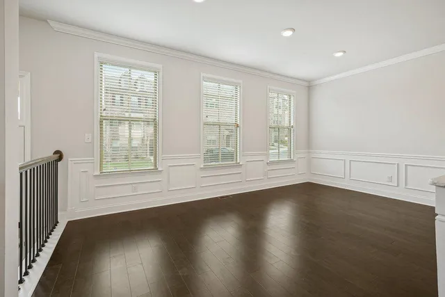a view of kitchen with table and window