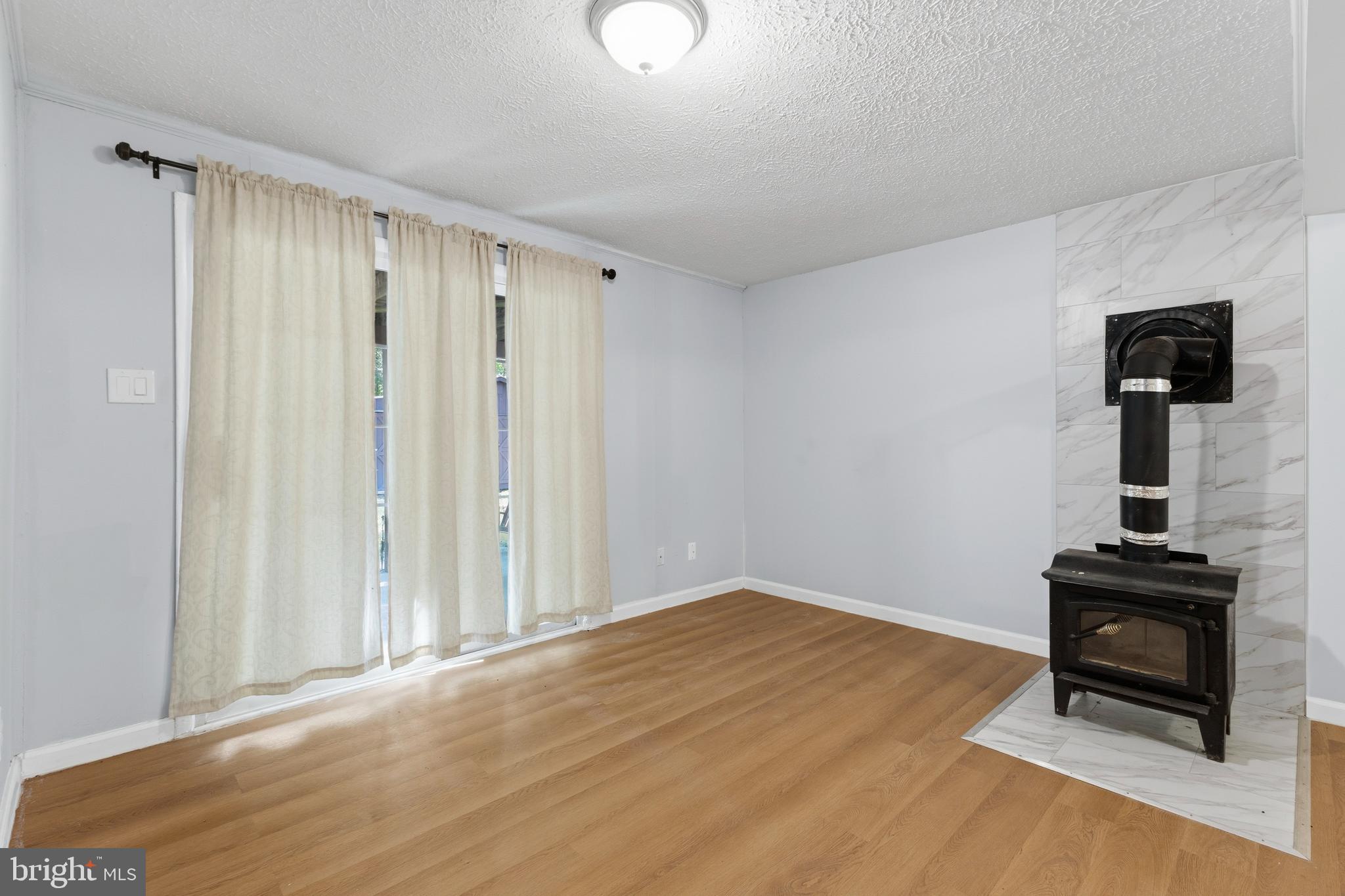 119 Jefferson Road Waldorf, MD 20602 - Photo 23 of 40 a view of a livingroom with wooden floor