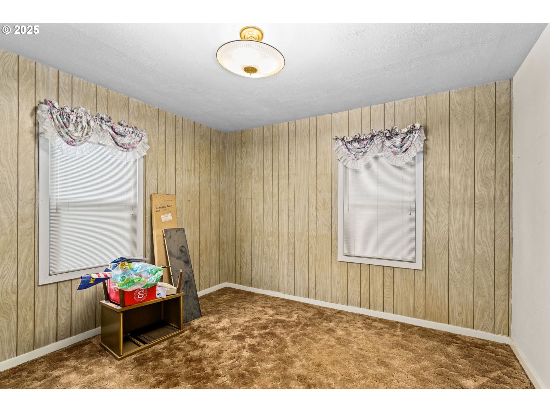 135 Ayres Road Eugene, OR 97408 - Photo 15 of 32 a living room with a couch and a table