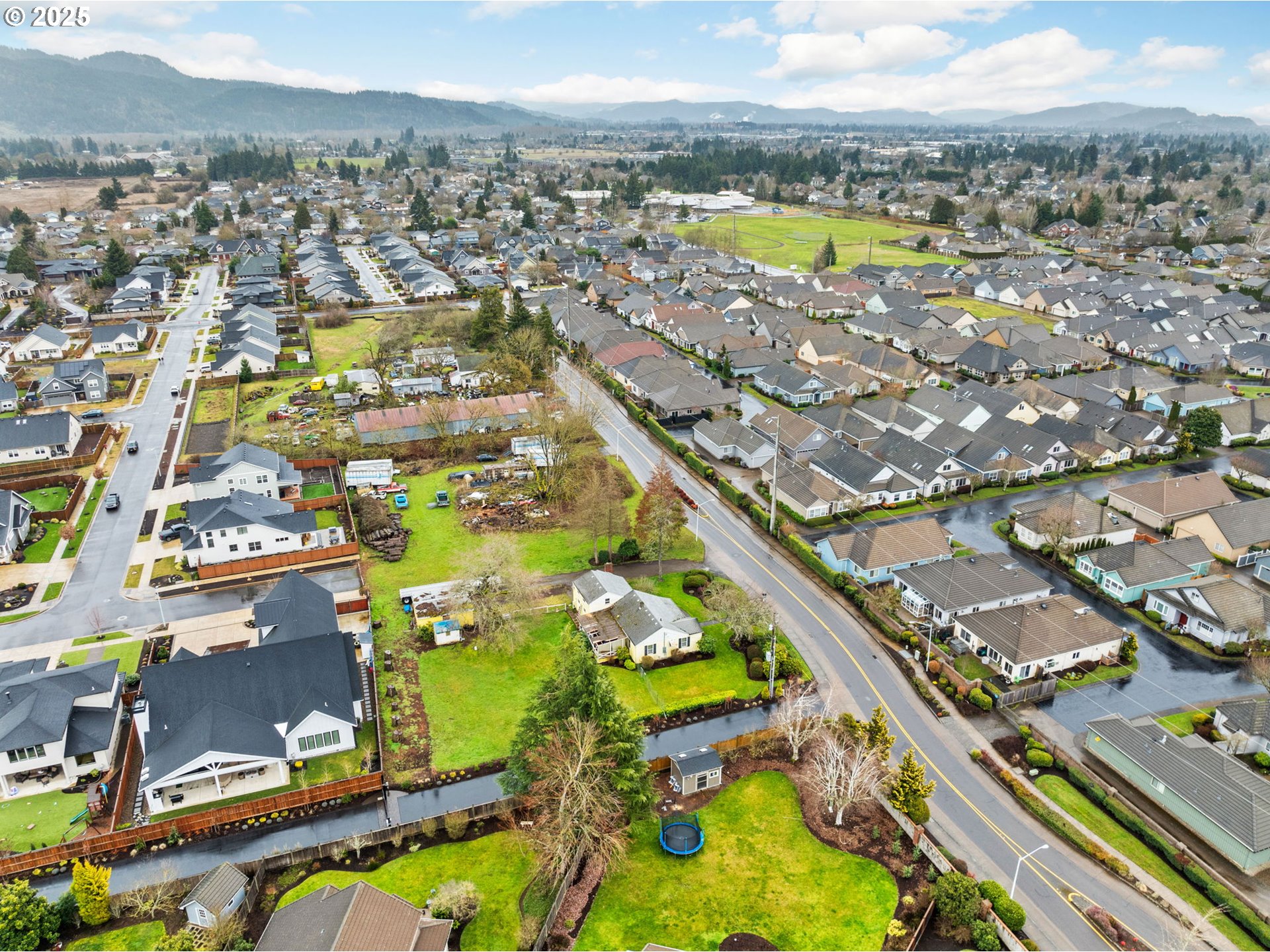 135 Ayres Road Eugene, OR 97408 - Photo 31 of 32 an aerial view of residential houses with outdoor space