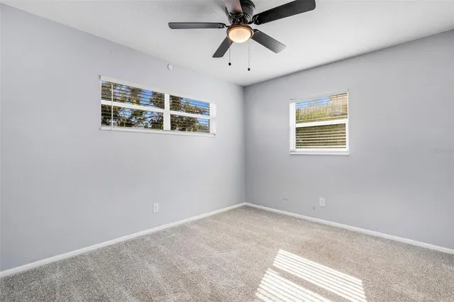 an empty room with windows