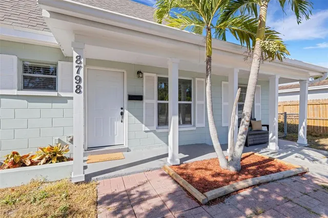 a front view of a house with a porch