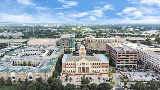 a view of a city with tall buildings