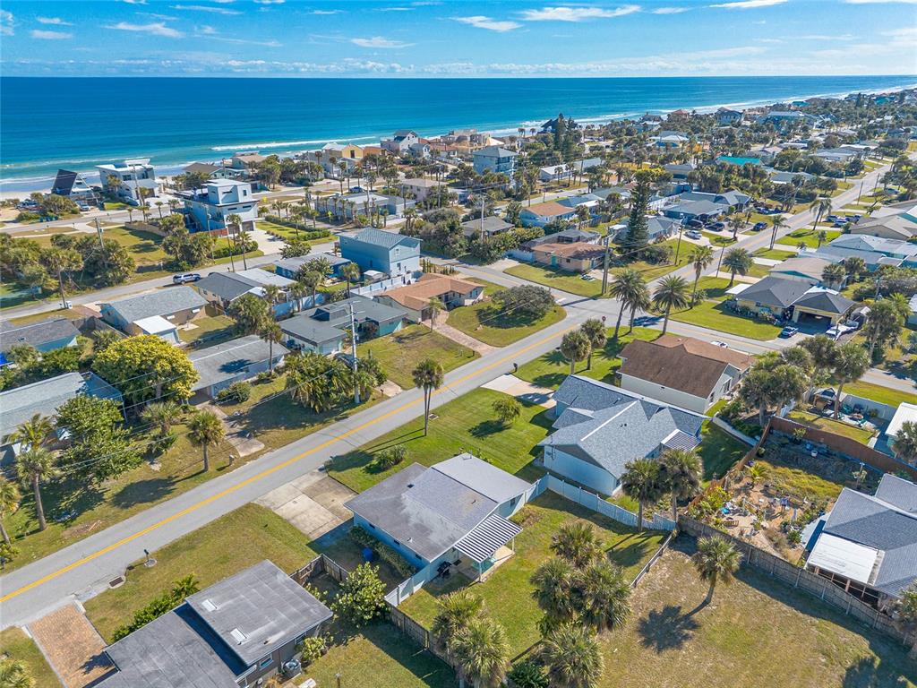 3948 Cardinal Boulevard Port Orange, FL 32127 - Photo 30 of 37 an aerial view of residential houses with outdoor space