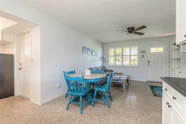 a view of a dining room with furniture