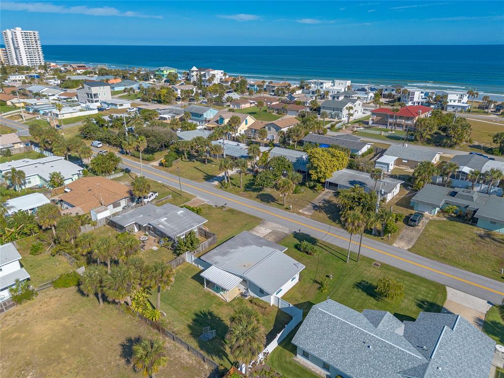 3948 Cardinal Boulevard Port Orange, FL 32127 - Photo 32 of 37 an aerial view of residential houses with outdoor space
