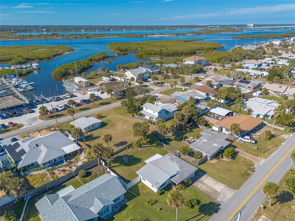 3948 Cardinal Boulevard Port Orange, FL 32127 - Photo 34 of 37 an aerial view of residential building with outdoor space