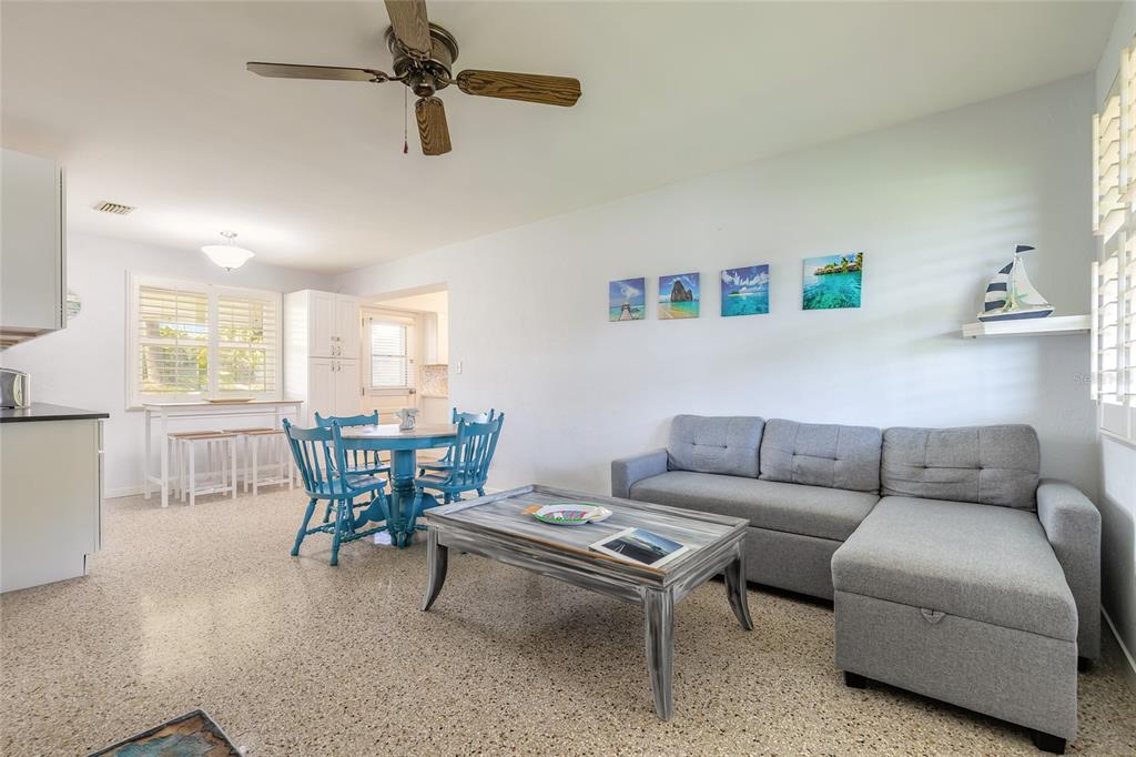 3948 Cardinal Boulevard Port Orange, FL 32127 - Photo 4 of 37 a living room with furniture and a window