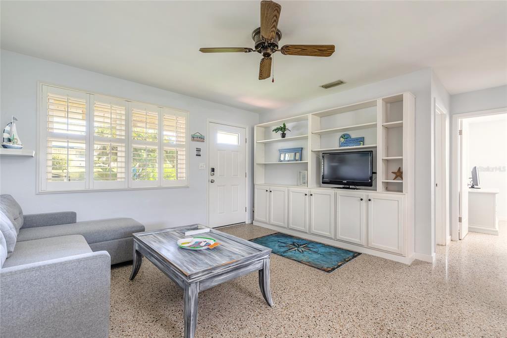 3948 Cardinal Boulevard Port Orange, FL 32127 - Photo 5 of 37 a living room with furniture and a flat screen tv