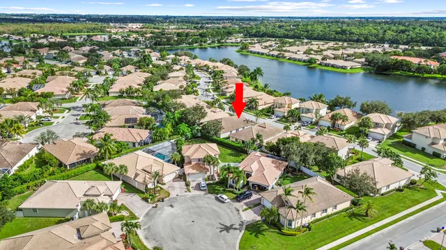 an aerial view of lake residential house with outdoor space