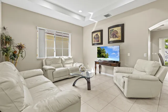 a view of a dining room and chandelier
