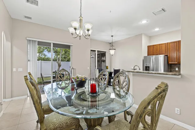 a bedroom with a bed and a large mirror