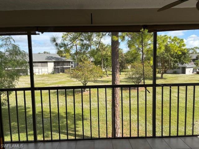 1220 Commonwealth Circle, Unit M206 Naples, FL 34116 - Photo 7 of 8 a view of a street from a balcony
