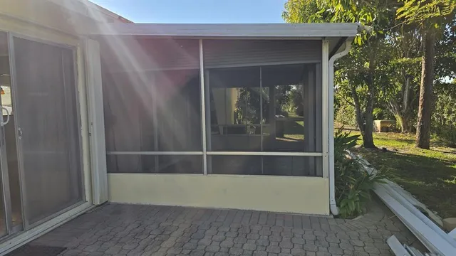 a view of a glass door with a balcony