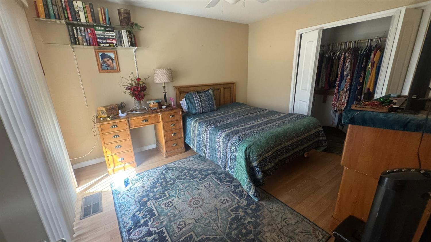 31160 Revis Road Coarsegold, CA 93614 - Photo 10 of 15 a bedroom with a bed and a mirror