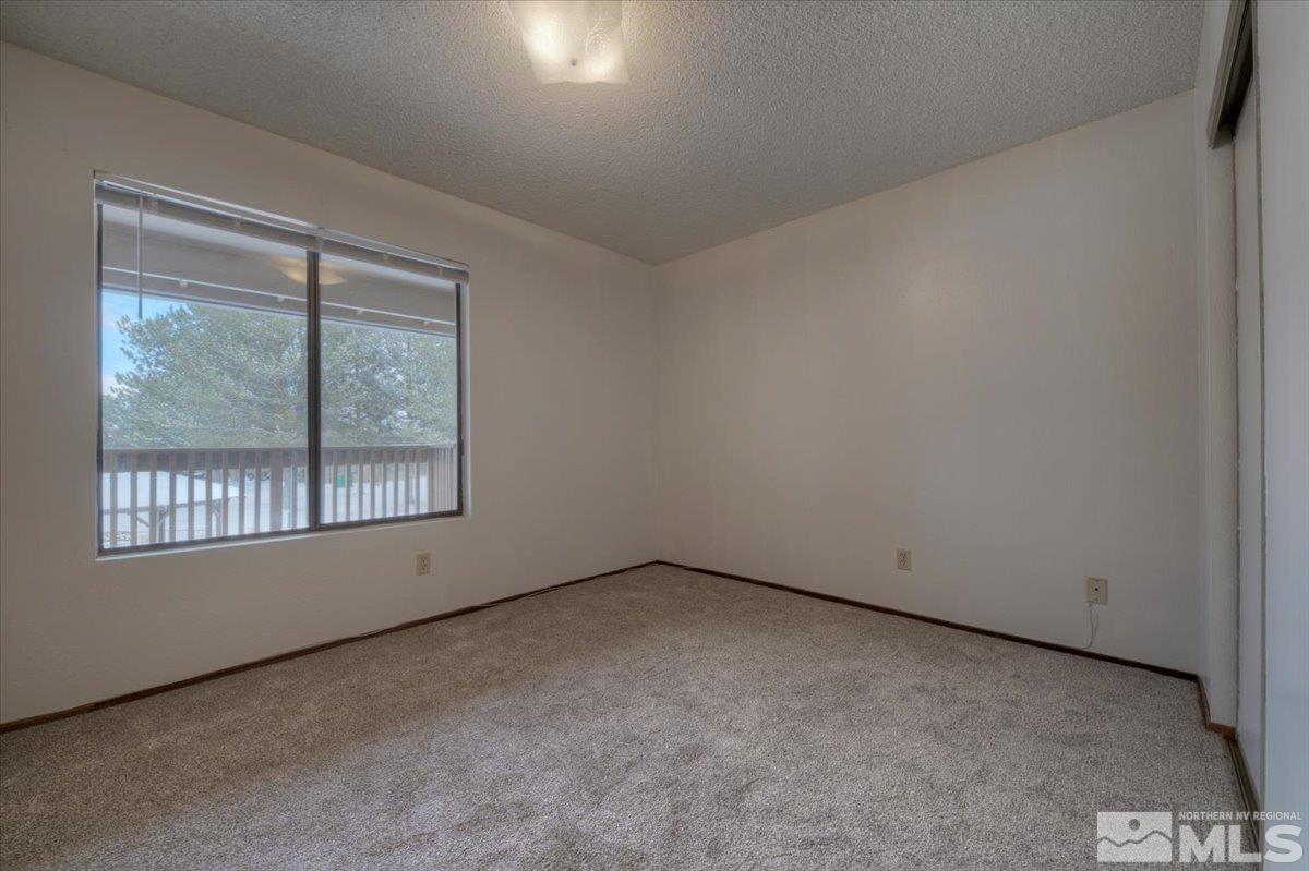 4658 Rio Poco Road Reno, NV 89502 - Photo 12 of 31 an empty room with a window