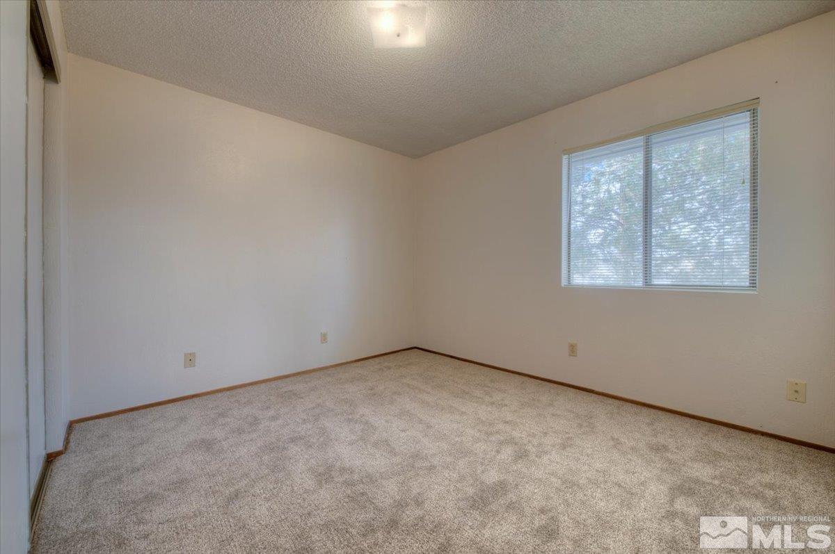 4658 Rio Poco Road Reno, NV 89502 - Photo 14 of 31 an empty room with a window