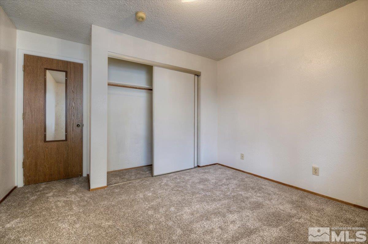 4658 Rio Poco Road Reno, NV 89502 - Photo 15 of 31 an empty room with closet