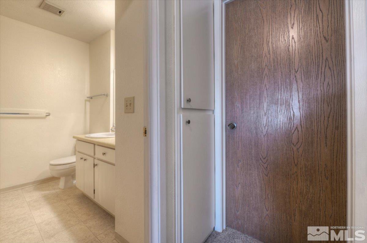 4658 Rio Poco Road Reno, NV 89502 - Photo 16 of 31 a bathroom with a sink and a toilet