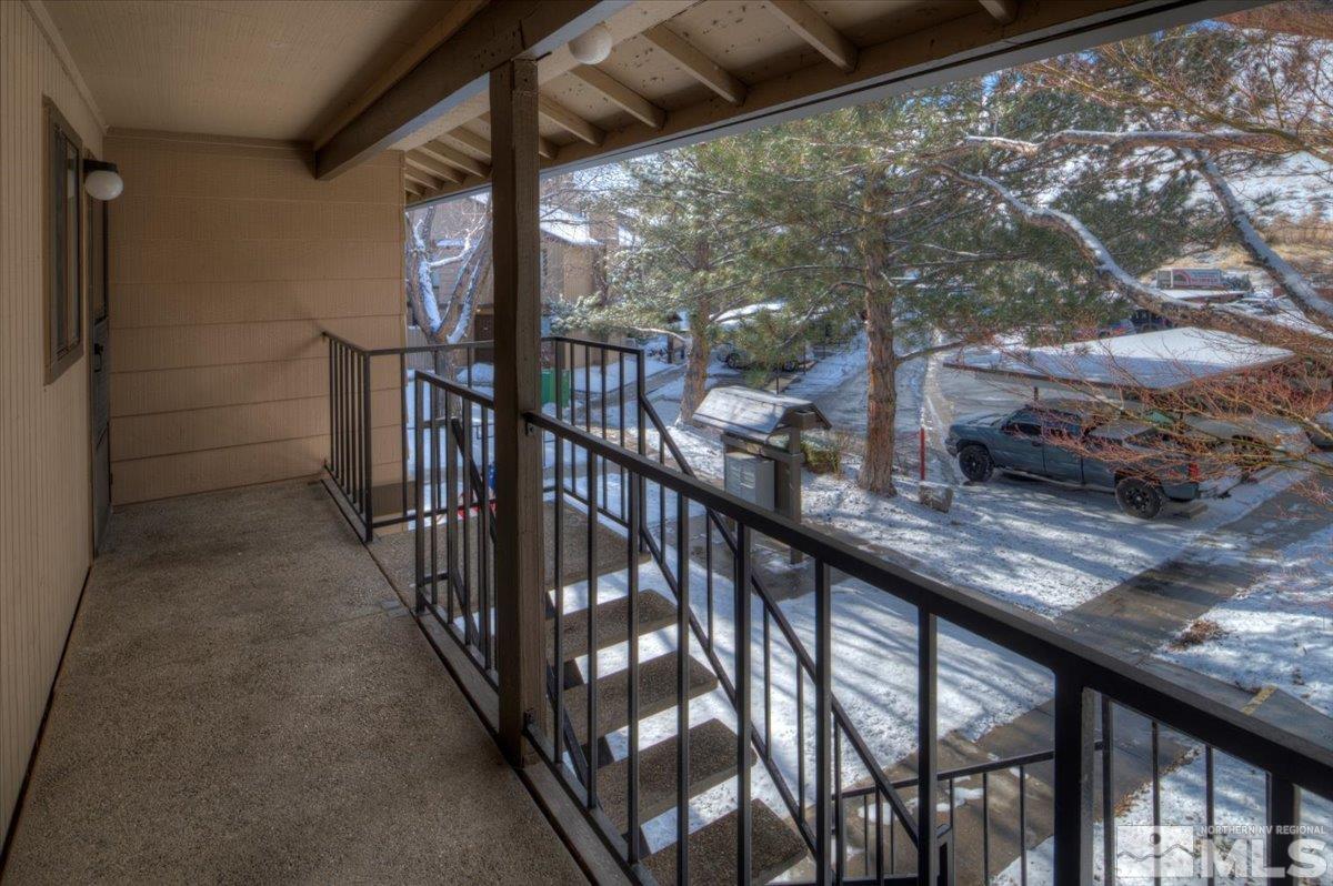 4658 Rio Poco Road Reno, NV 89502 - Photo 2 of 31 a view of balcony with wooden floor