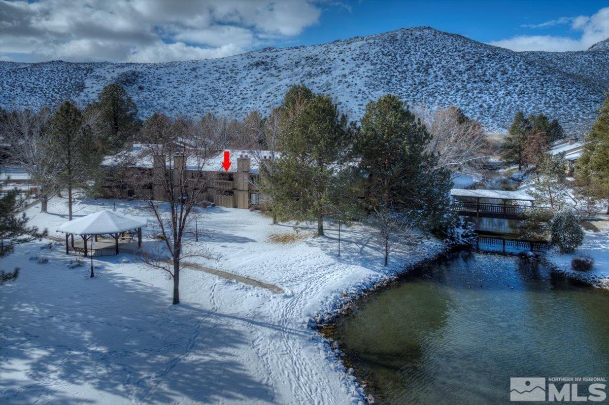 4658 Rio Poco Road Reno, NV 89502 - Photo 22 of 31 a swimming pool with outdoor seating