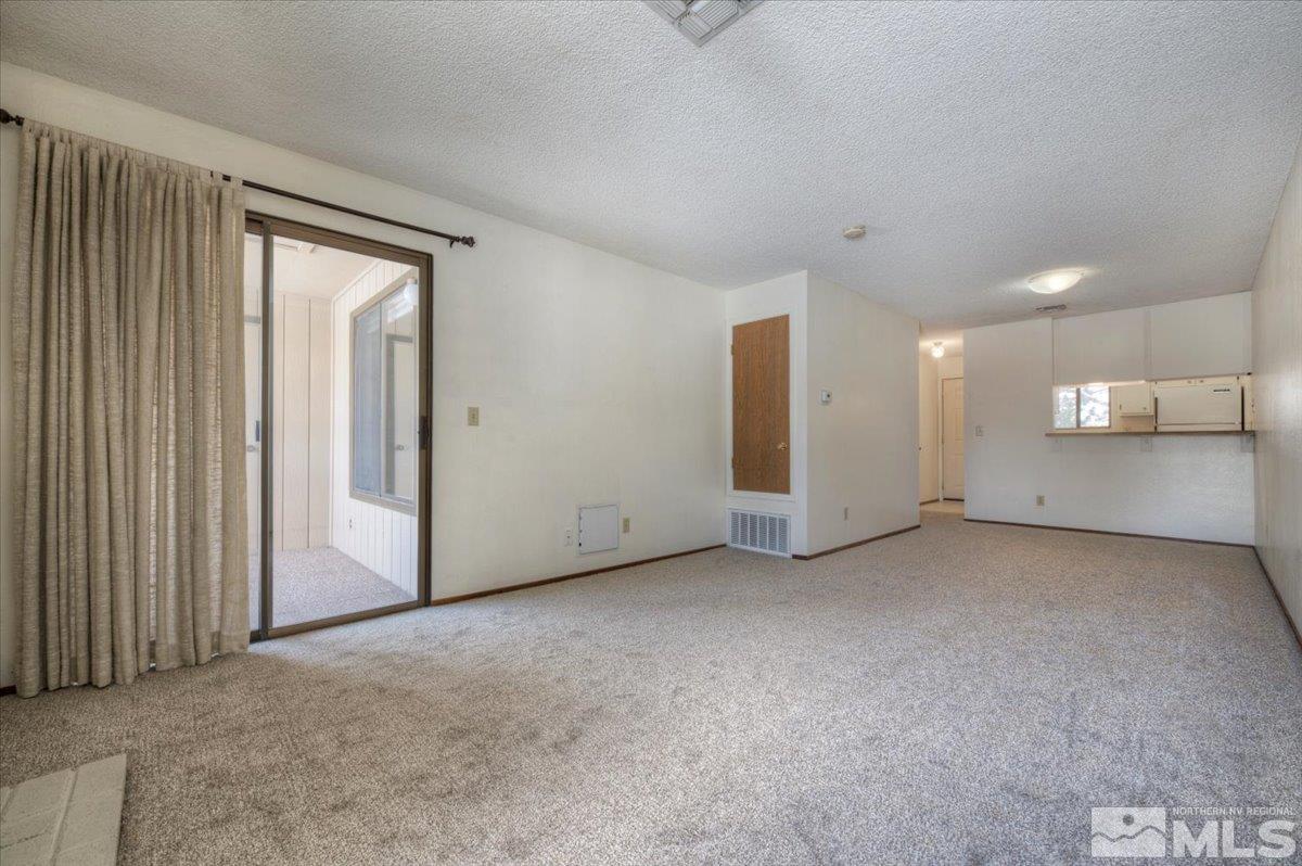 4658 Rio Poco Road Reno, NV 89502 - Photo 9 of 31 a view of an empty room