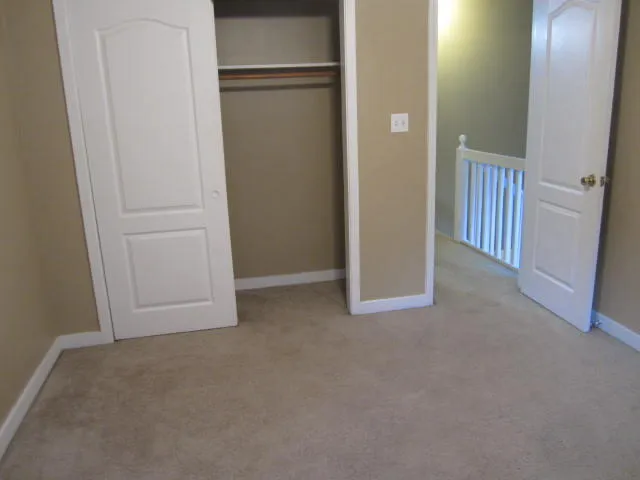 a view of a room with an empty space