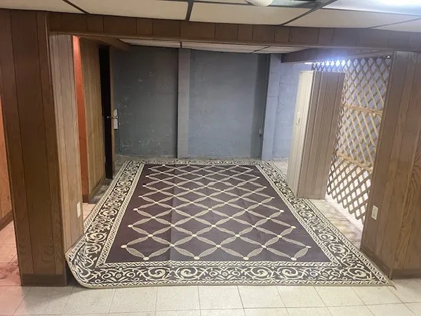 an outdoor space with a rug