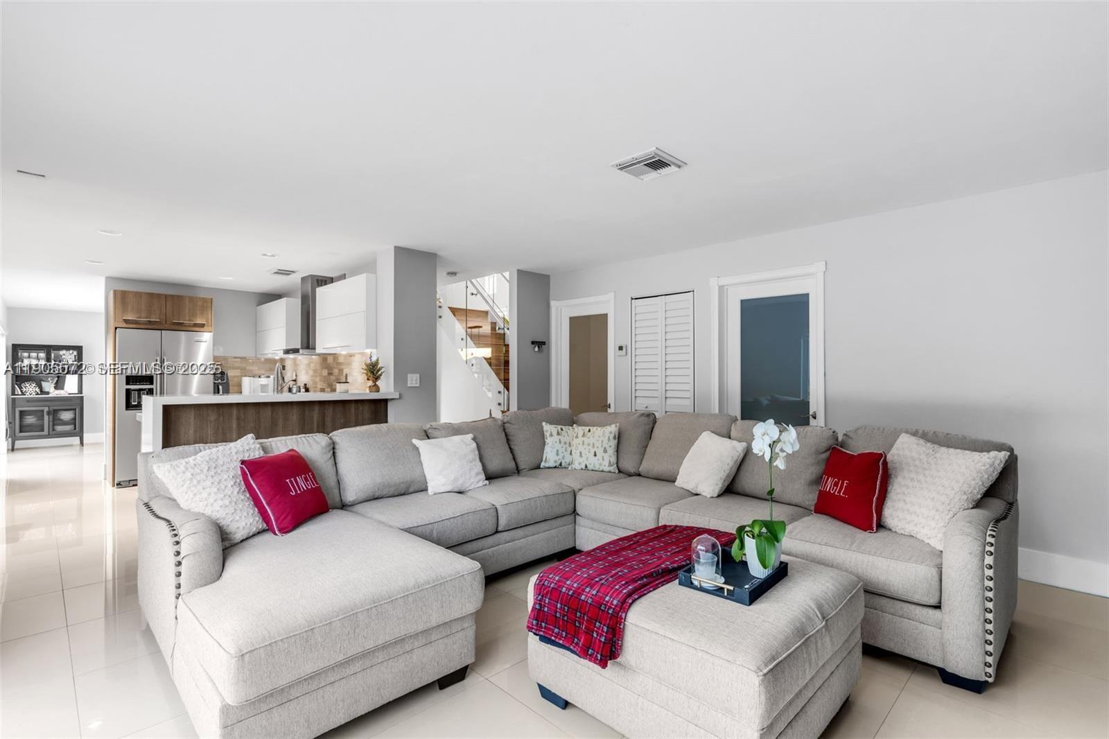 14206 Southwest 164th Terrace Miami, FL 33177 - Photo 18 of 58 a living room with furniture and a couch